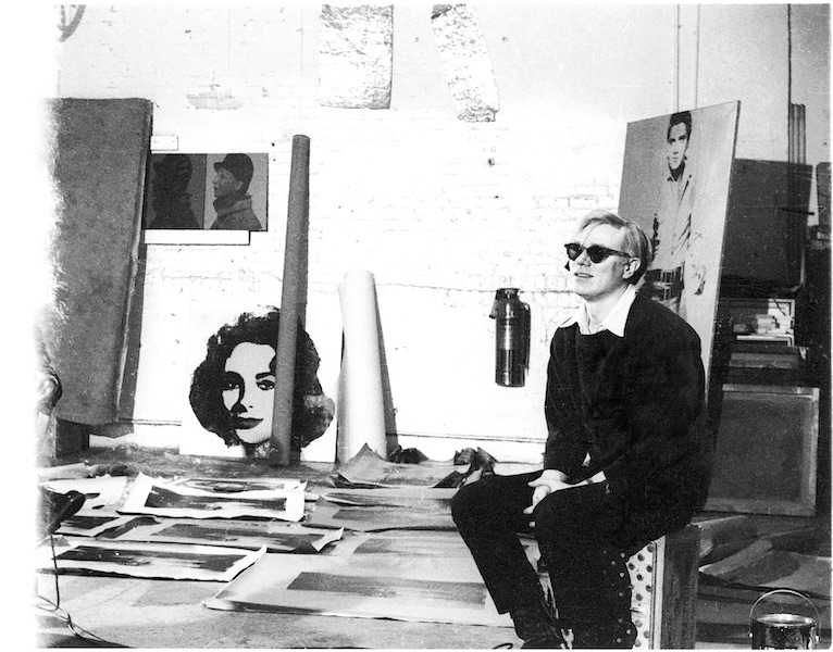 Andy Warhol with Silver Liz Taylor, Silver Elvis, and Electric Chair Paintings, 1964 – silkscreen 19 x 25in., edition of 40
